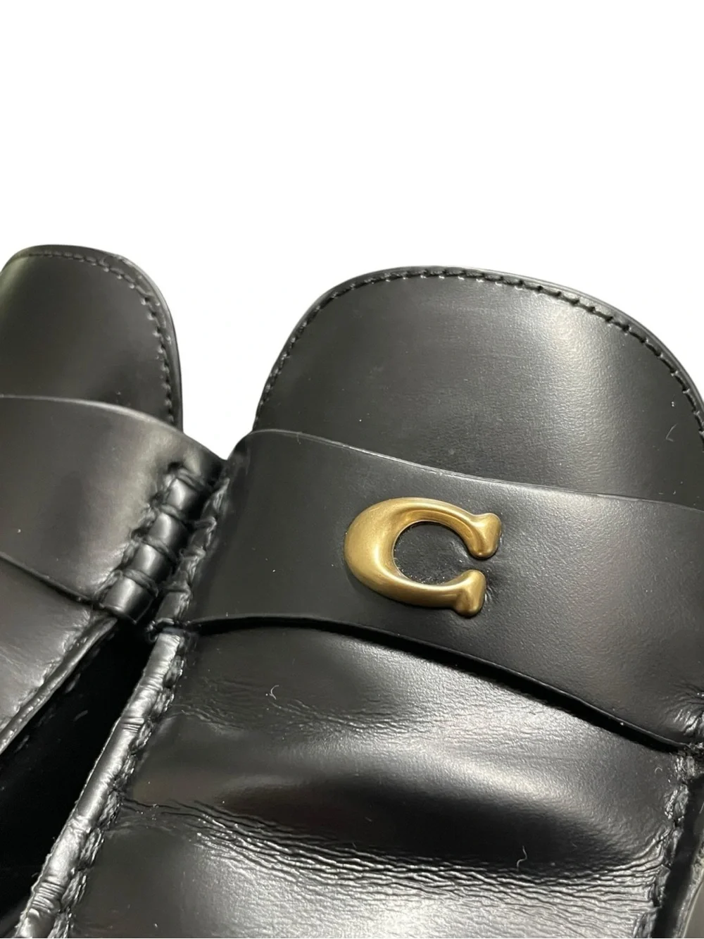Coach Black Leather Loafers with Gold Accent